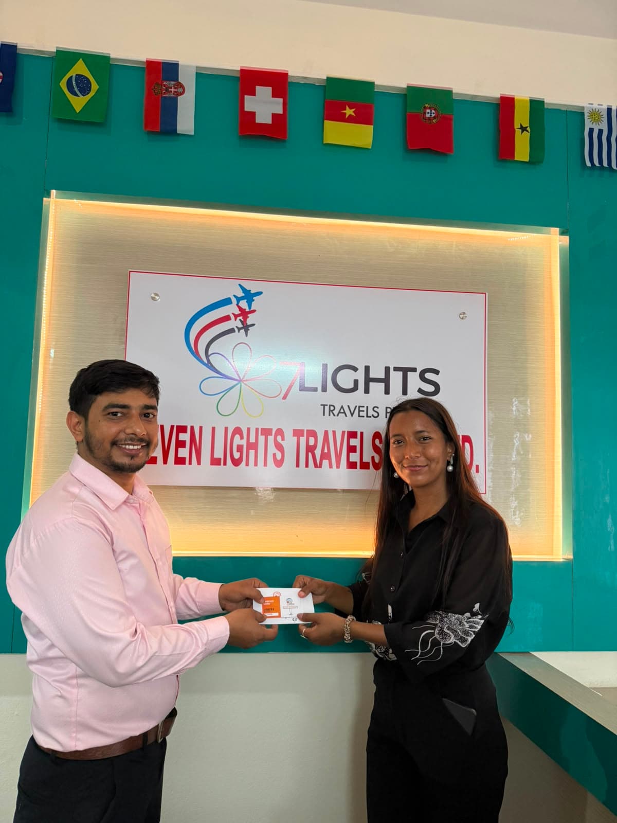 At the 7 Lights counter in Thamel, under the agency's sign